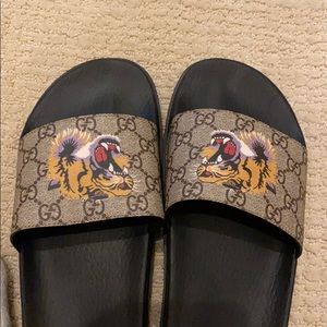 Gucci tiger print slides